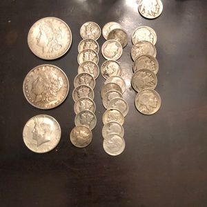 Mixed silver coins and Indian head nickels.